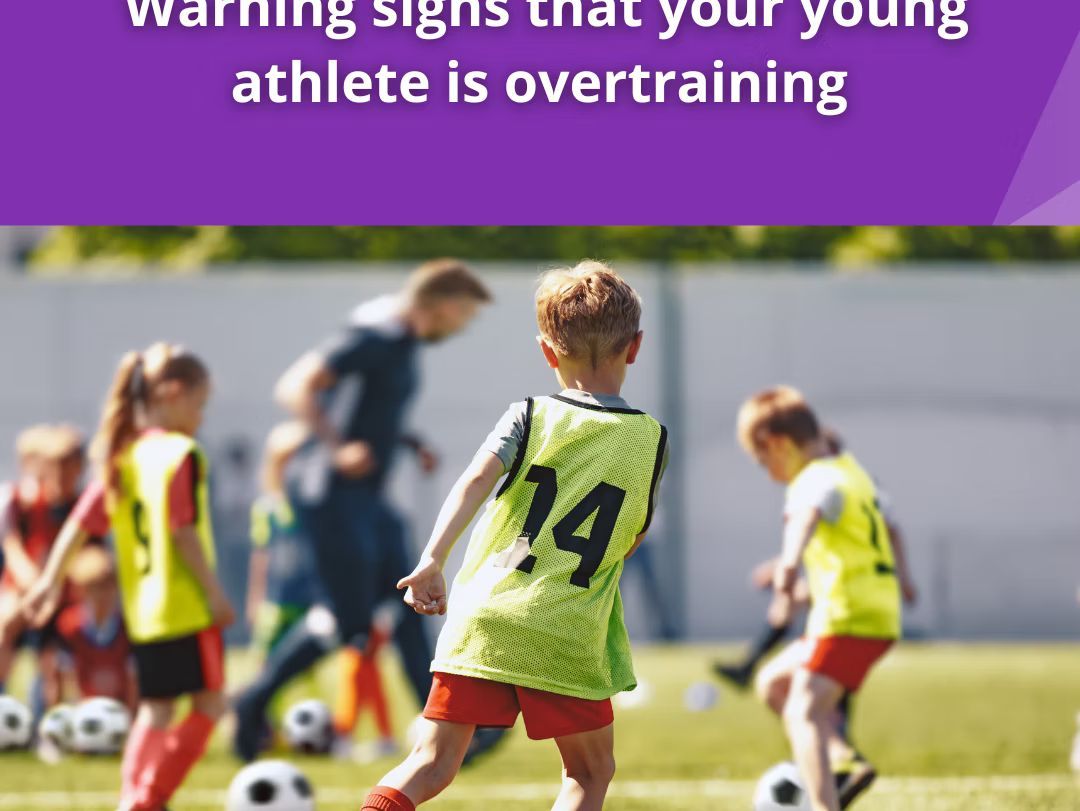 A picture of kids playing soccer.