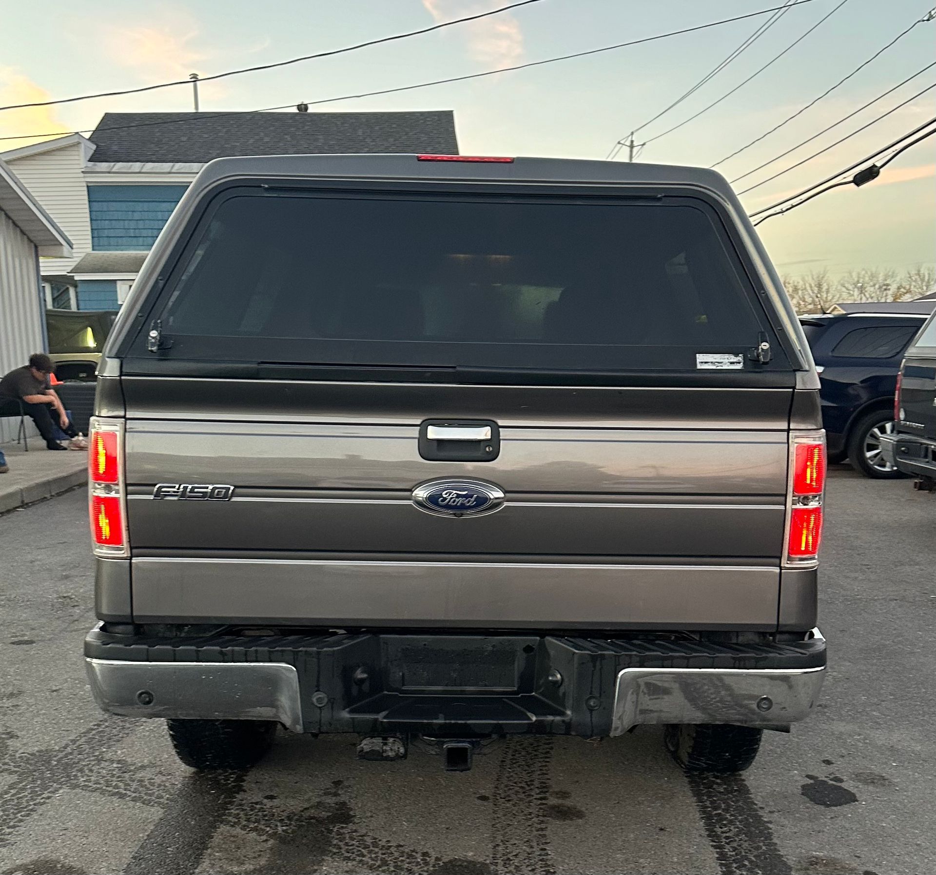 A ford truck is parked in a parking lot