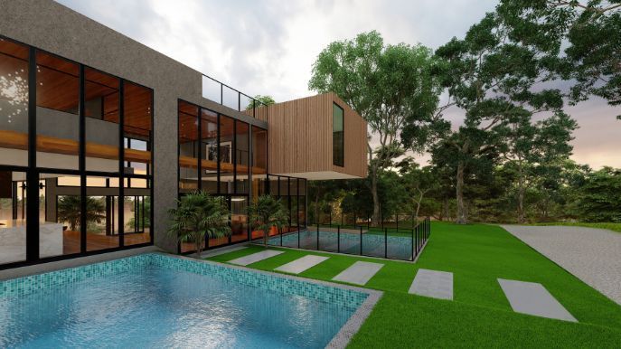 A Large House With a Swimming Pool in Front of It — Omni Builders In Bungalow, QLD