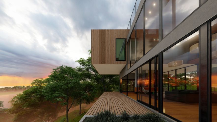 A Modern House With a Lot of Windows and a Wooden Deck — Omni Builders In Bungalow, QLD