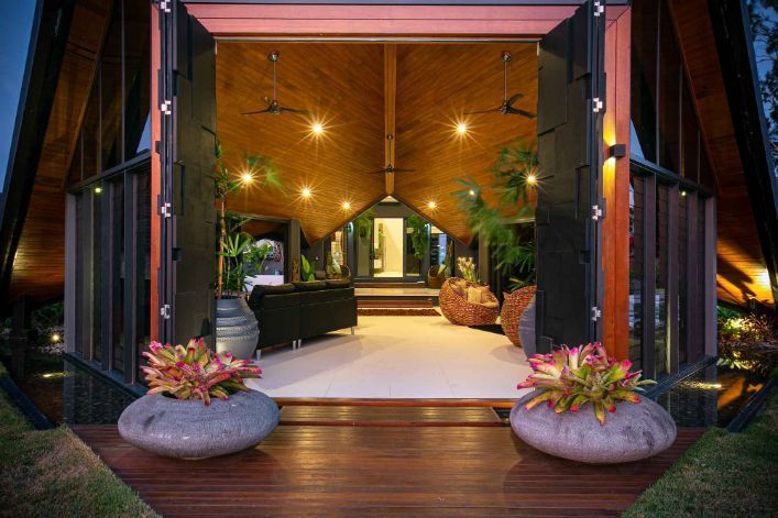 A View of a Living Room From the Outside of a House — Omni Builders In Bungalow, QLD