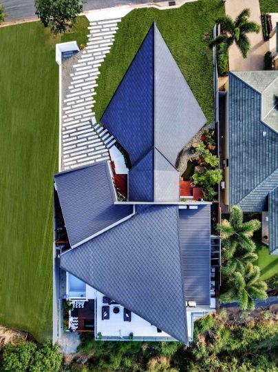 An Aerial View of a House With a Pyramid Shaped Roof — Omni Builders In Bungalow, QLD