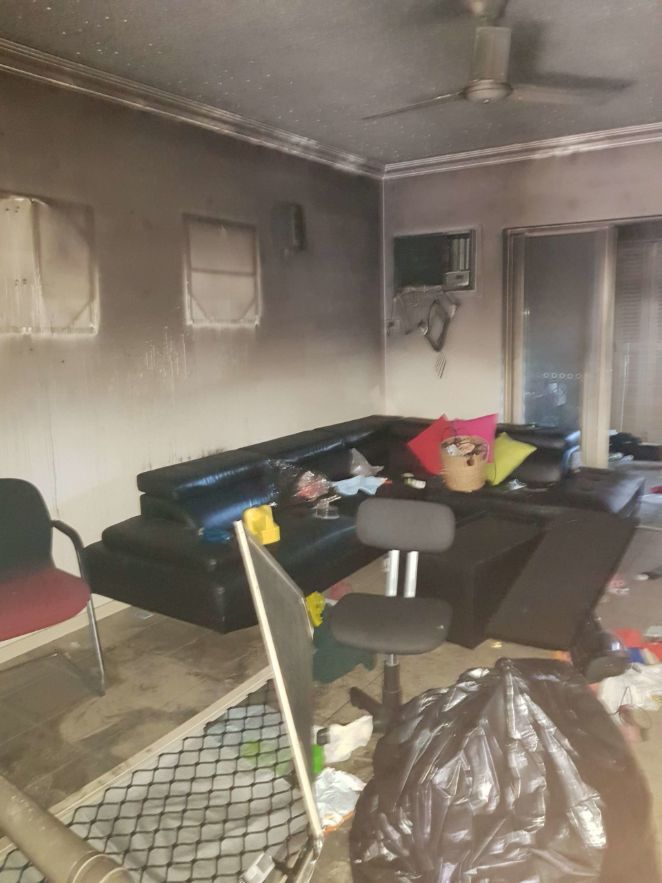 A Living Room With a Couch and Chairs and a Ceiling Fan — Omni Builders In Bungalow, QLD