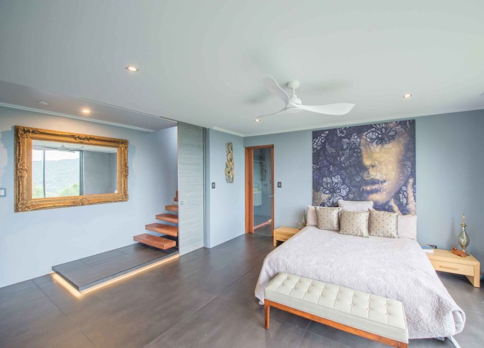 There is a Large Bed in the Middle of the Room — Omni Builders In Bungalow, QLD