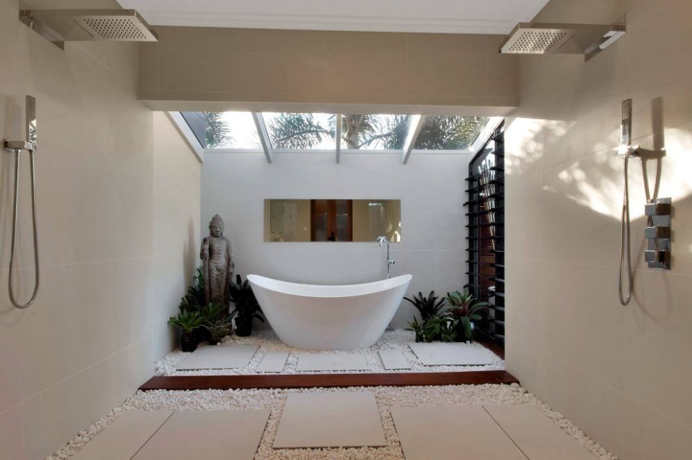 A Bathroom With a Bathtub and Two Showers — Omni Builders In Bungalow, QLD