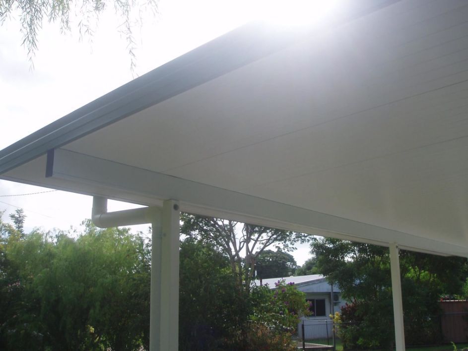 Sun is Shining Through the Roof of a House — Omni Builders In Bungalow, QLD