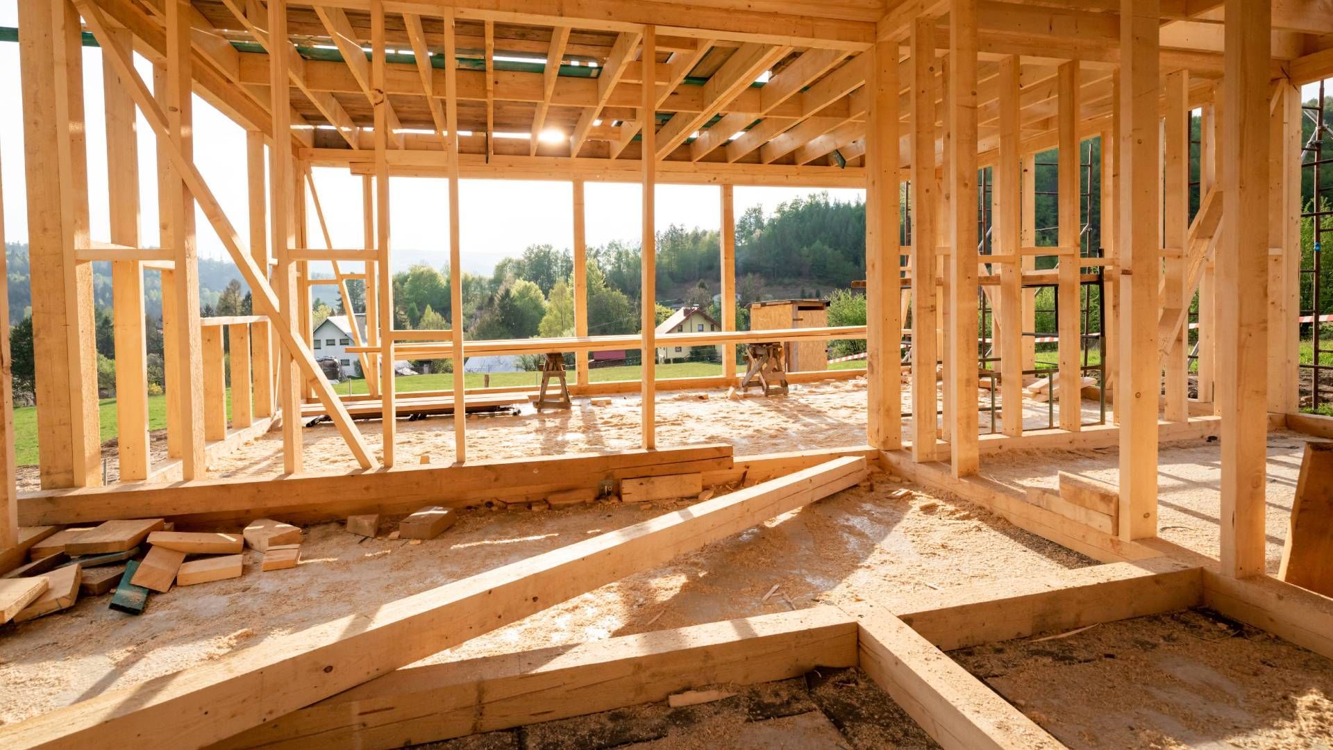 The inside of a wooden house under construction.