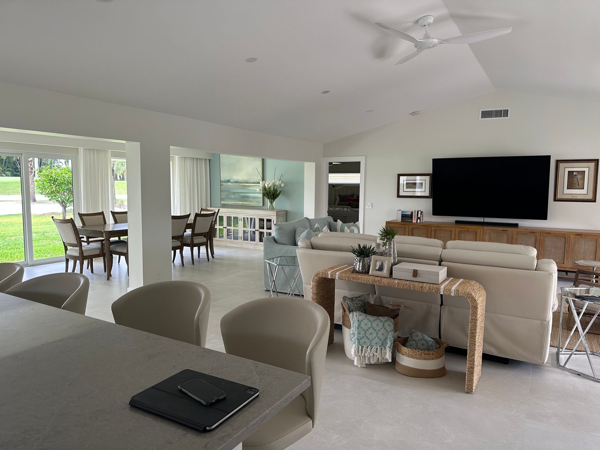 A living room filled with furniture and a flat screen tv