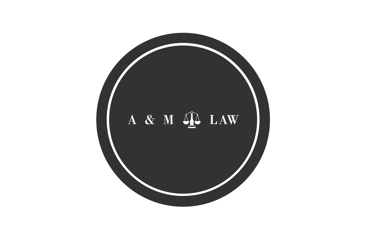A black circle with the words a & m law on it