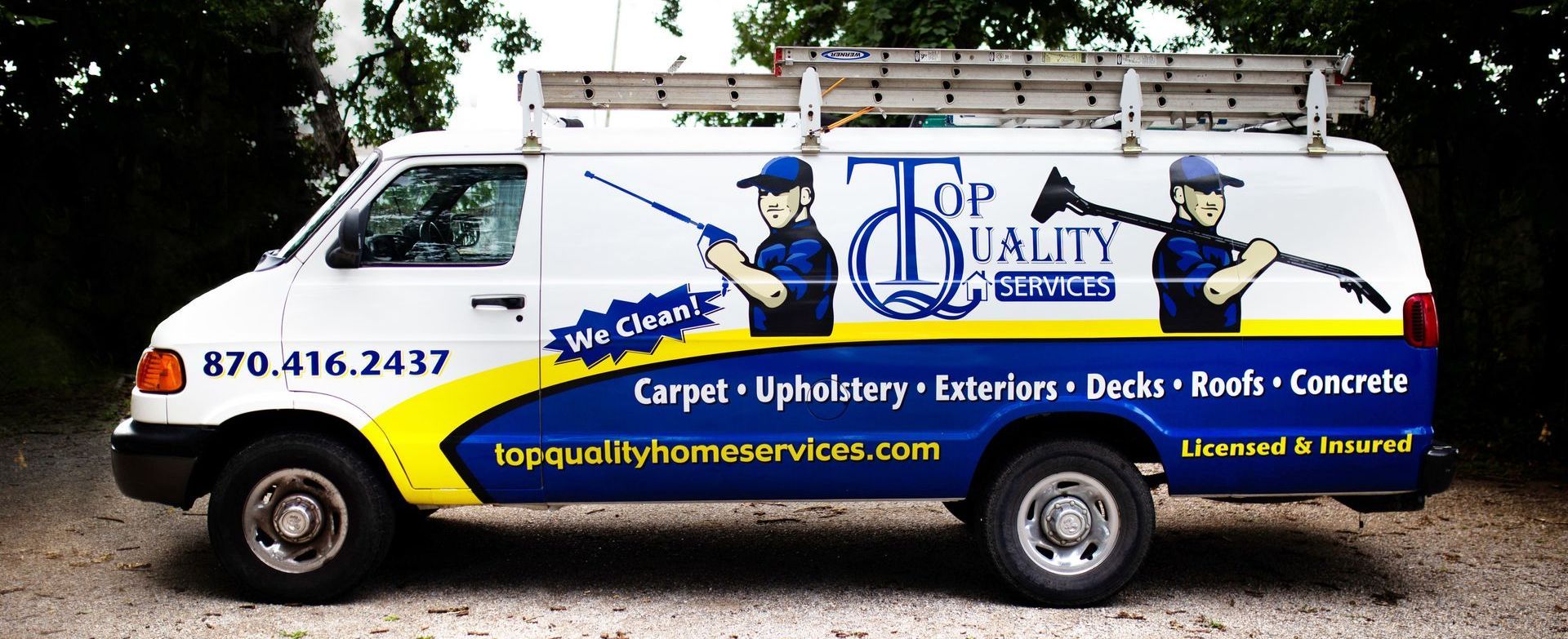 A van that says top quality on the side