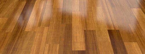 Sparkling clean laminate flooring, showcasing its smooth and polished surface.