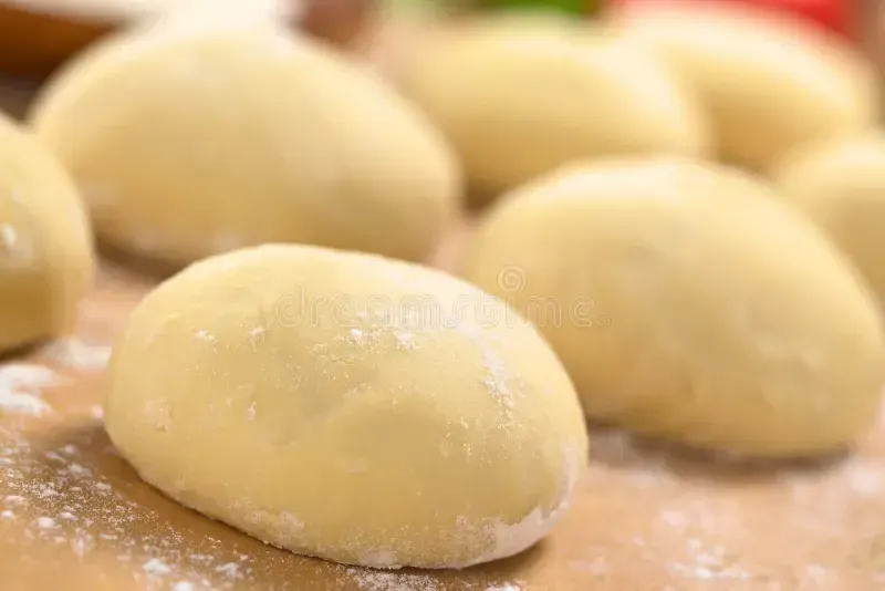 Dough Balls on A Wooden Surface — Stoked Pizza in Helensvale, QLD