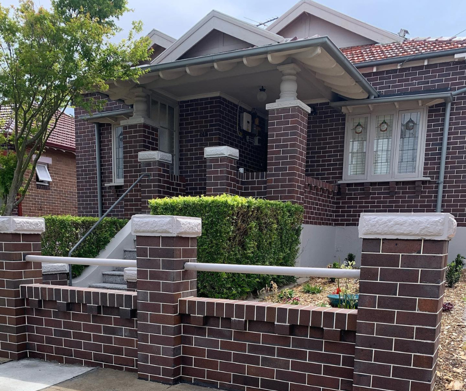 A brick bungalow house with weep holes for drainage