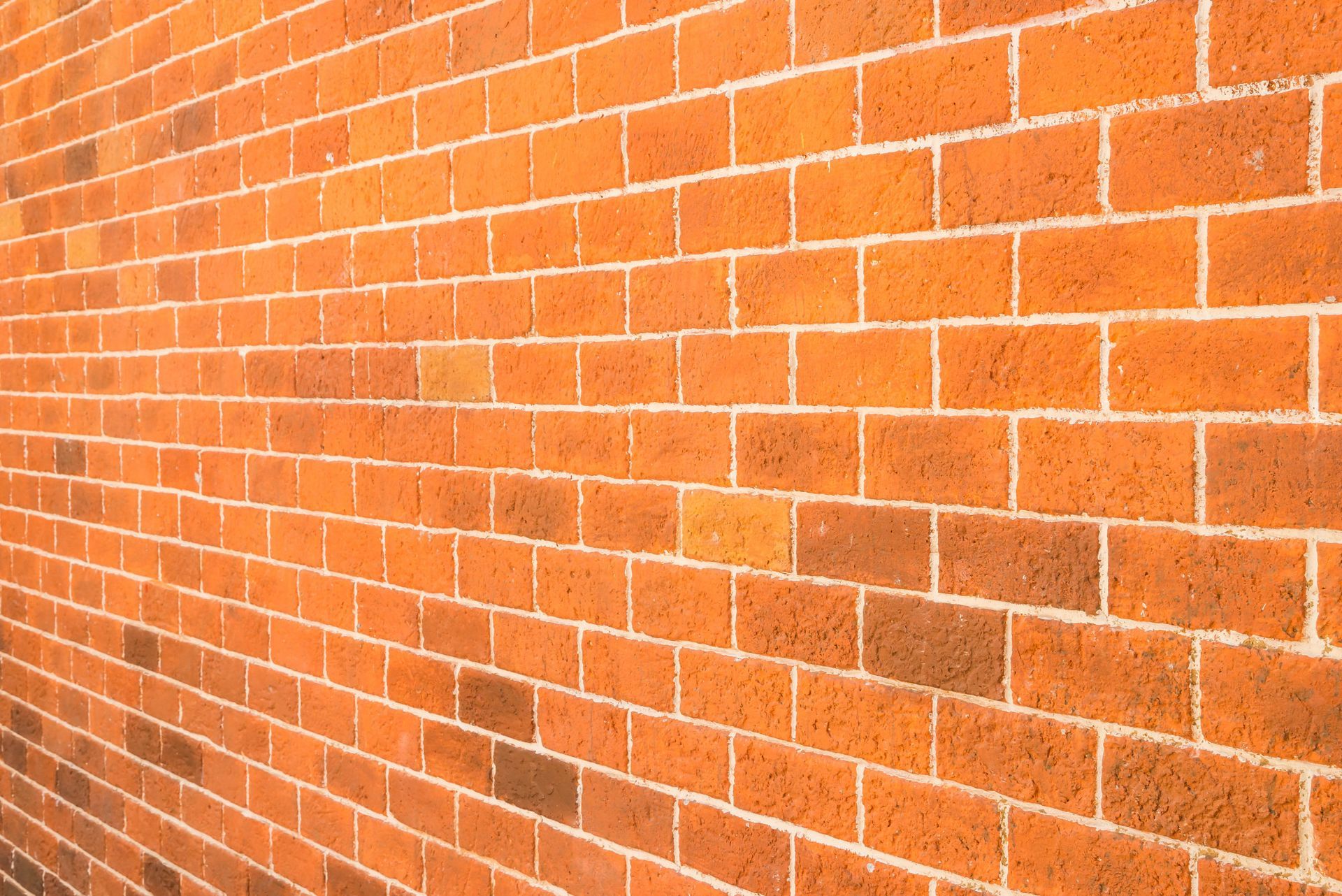 a close up of a red brick wall