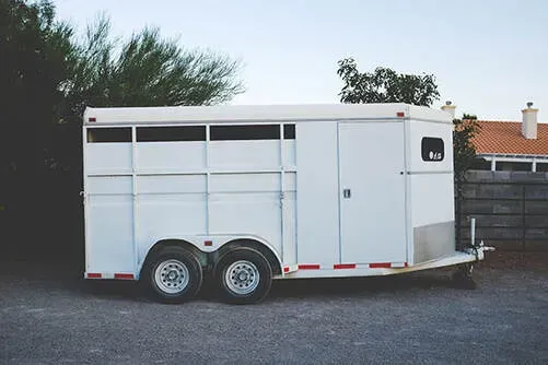 white horse trailer custom features made by welder near me