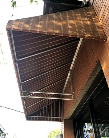 metal awning frame above storefront in Germantown