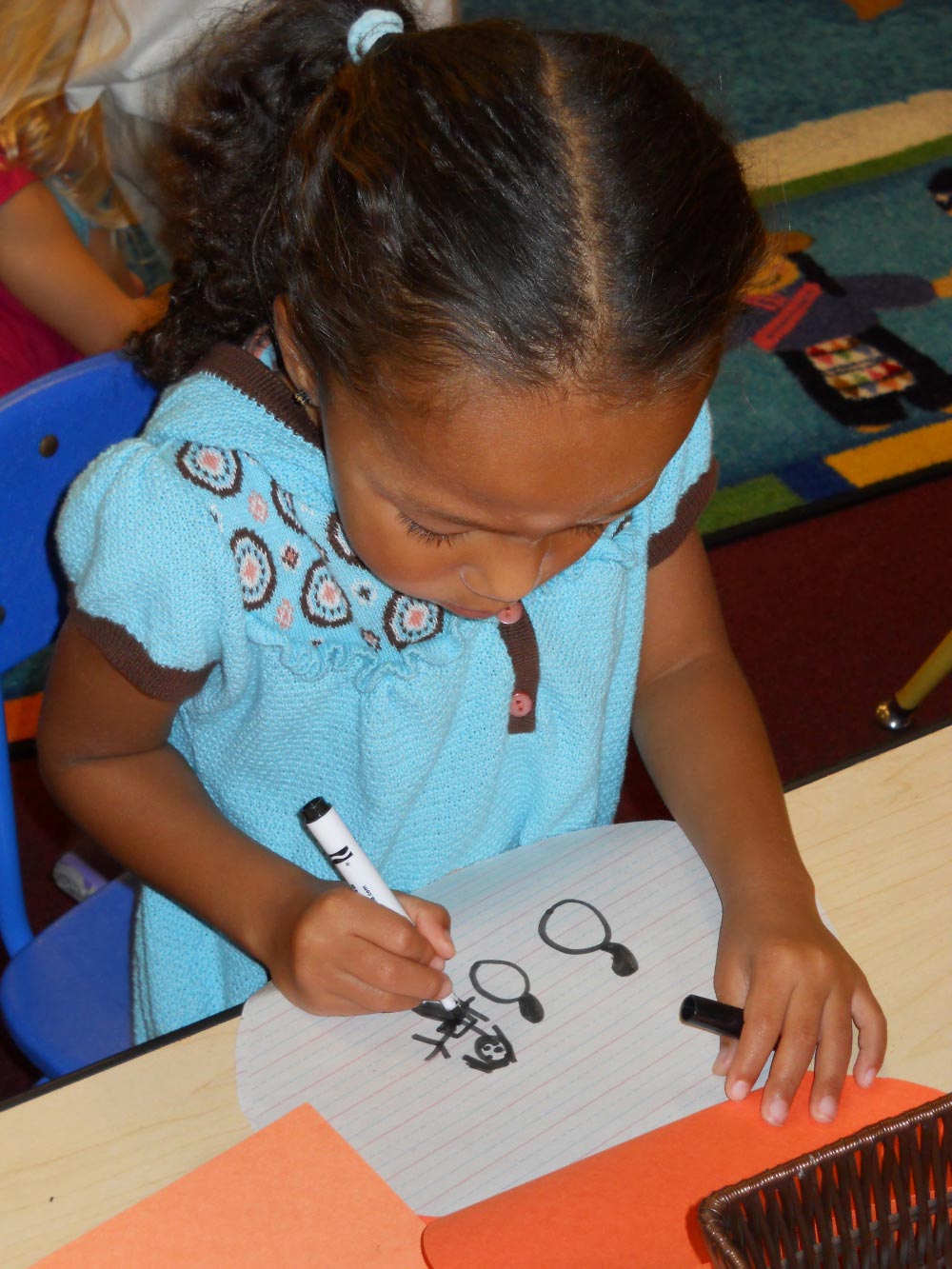 Little Girl Drawing Something — Bradenton, FL — Palma Sola Early Learning Academy
