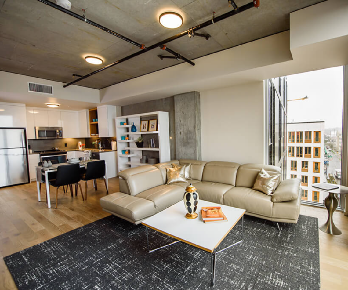 A living room with a couch and a coffee table