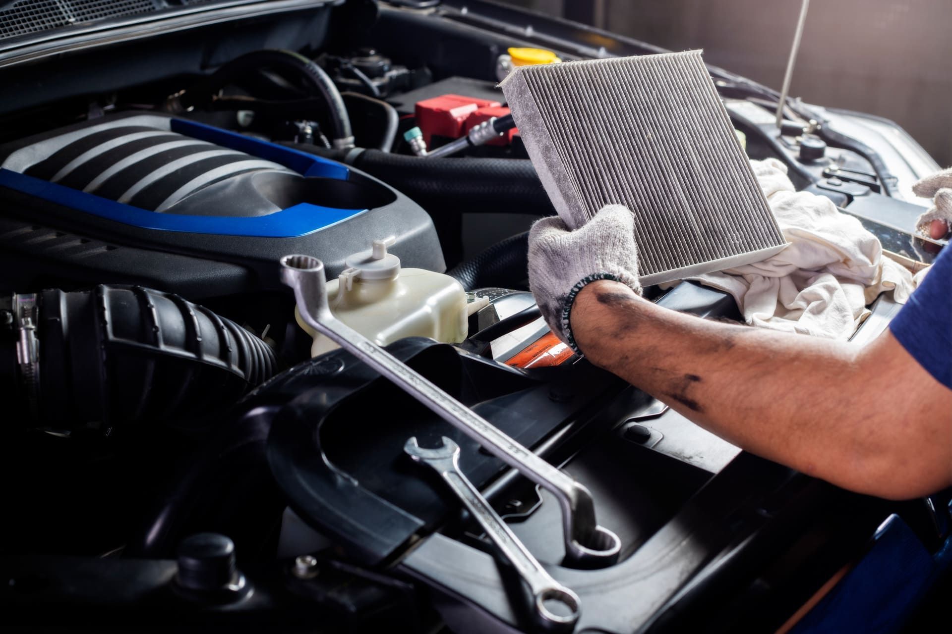 Car air conditioner system maintenance, Hand mechanic holding car air filter to check for clean dirty or fix repair heat have a problem or replace new or change filter