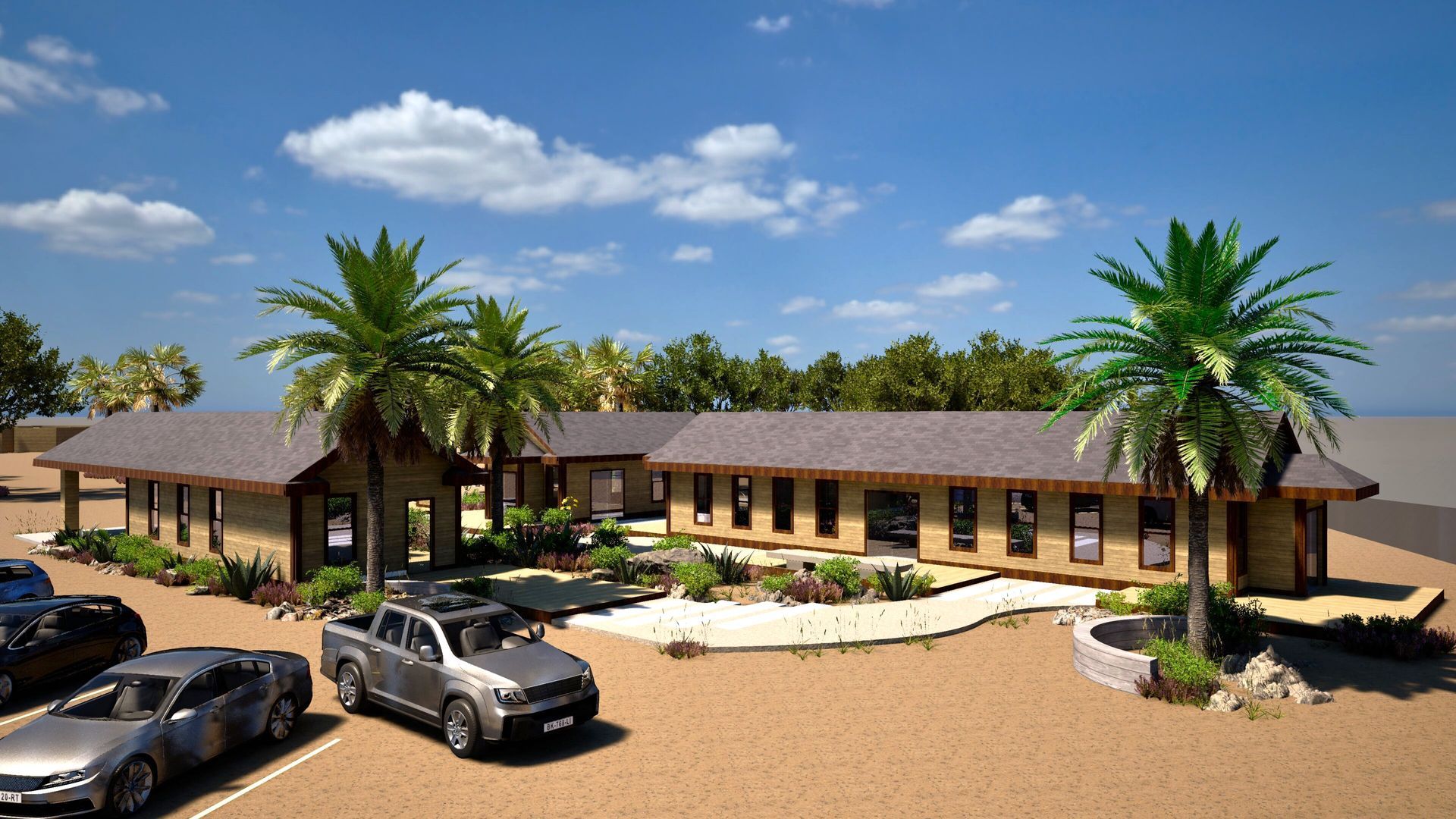 An aerial view of a house with cars parked in front of it