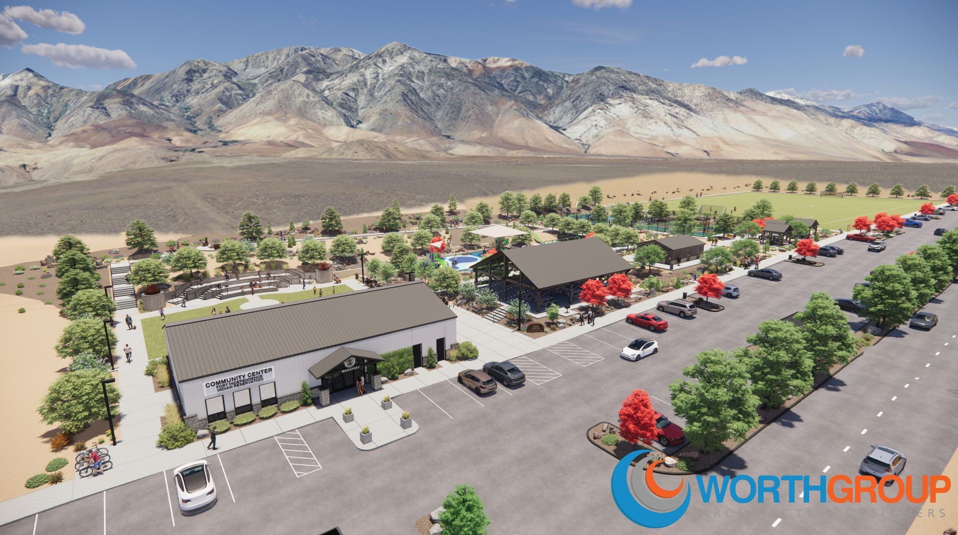 An aerial view of a worth group property with mountains in the background