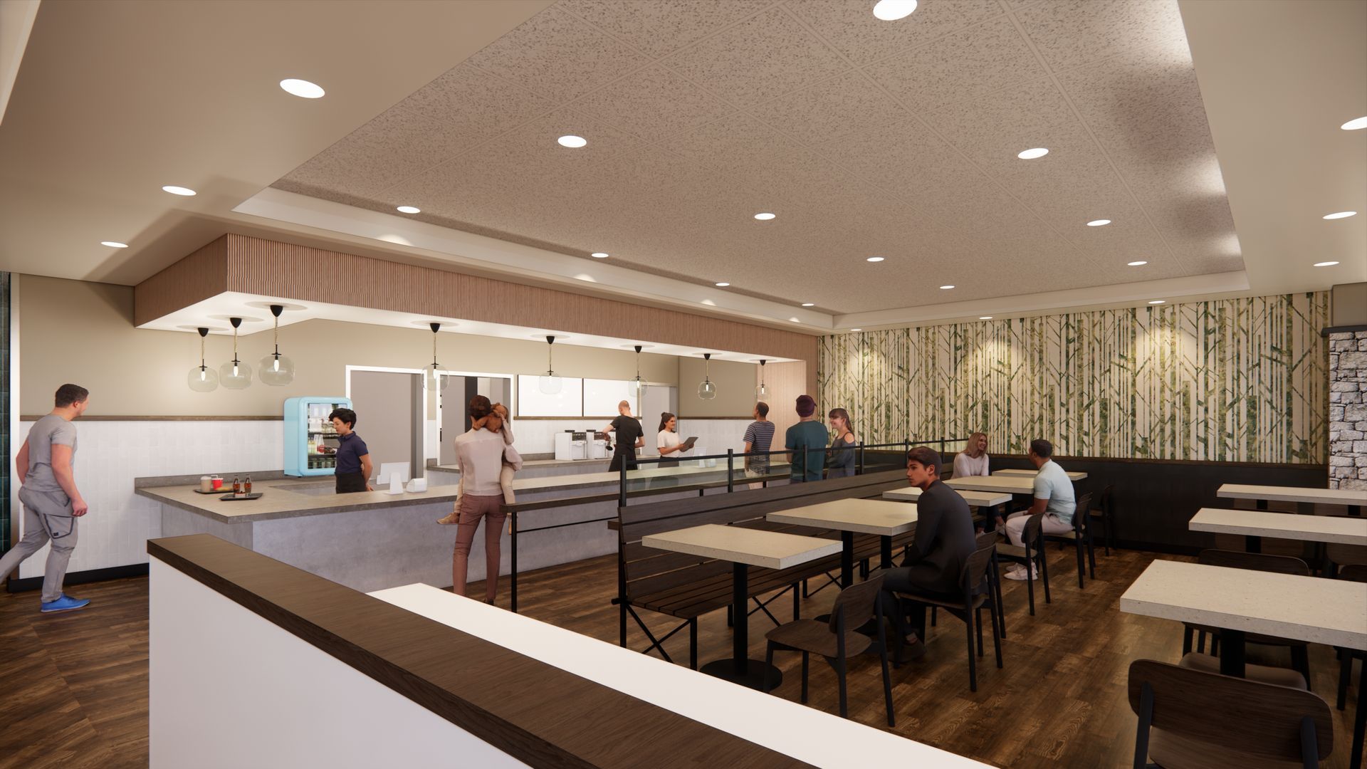 A group of people are sitting at tables in a restaurant.