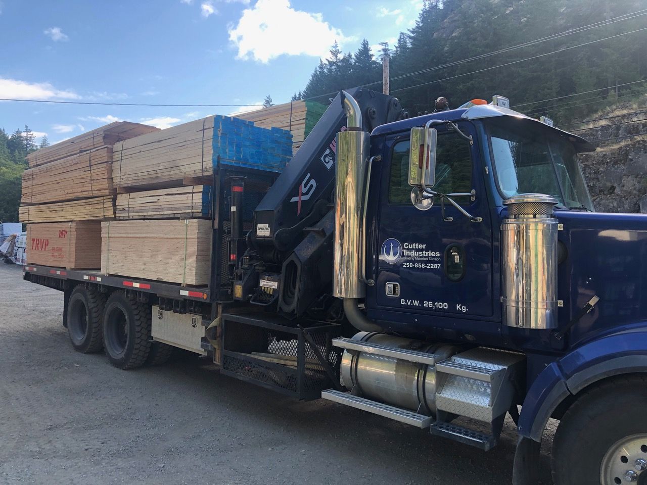 Bricks and pipes are lined up on shelves in a store