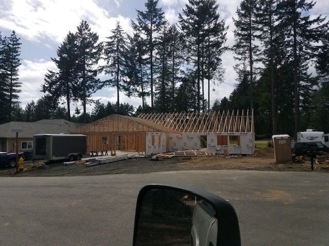 A house is being built in the middle of a forest