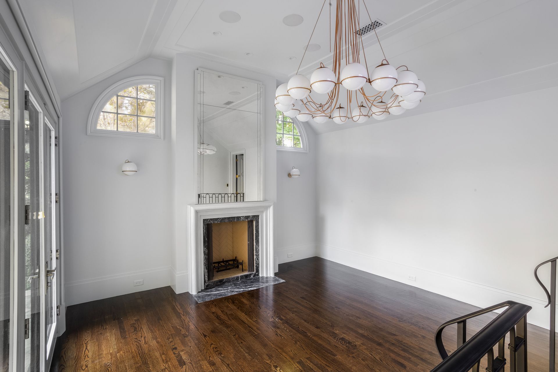 There is a fireplace in the middle of the room.