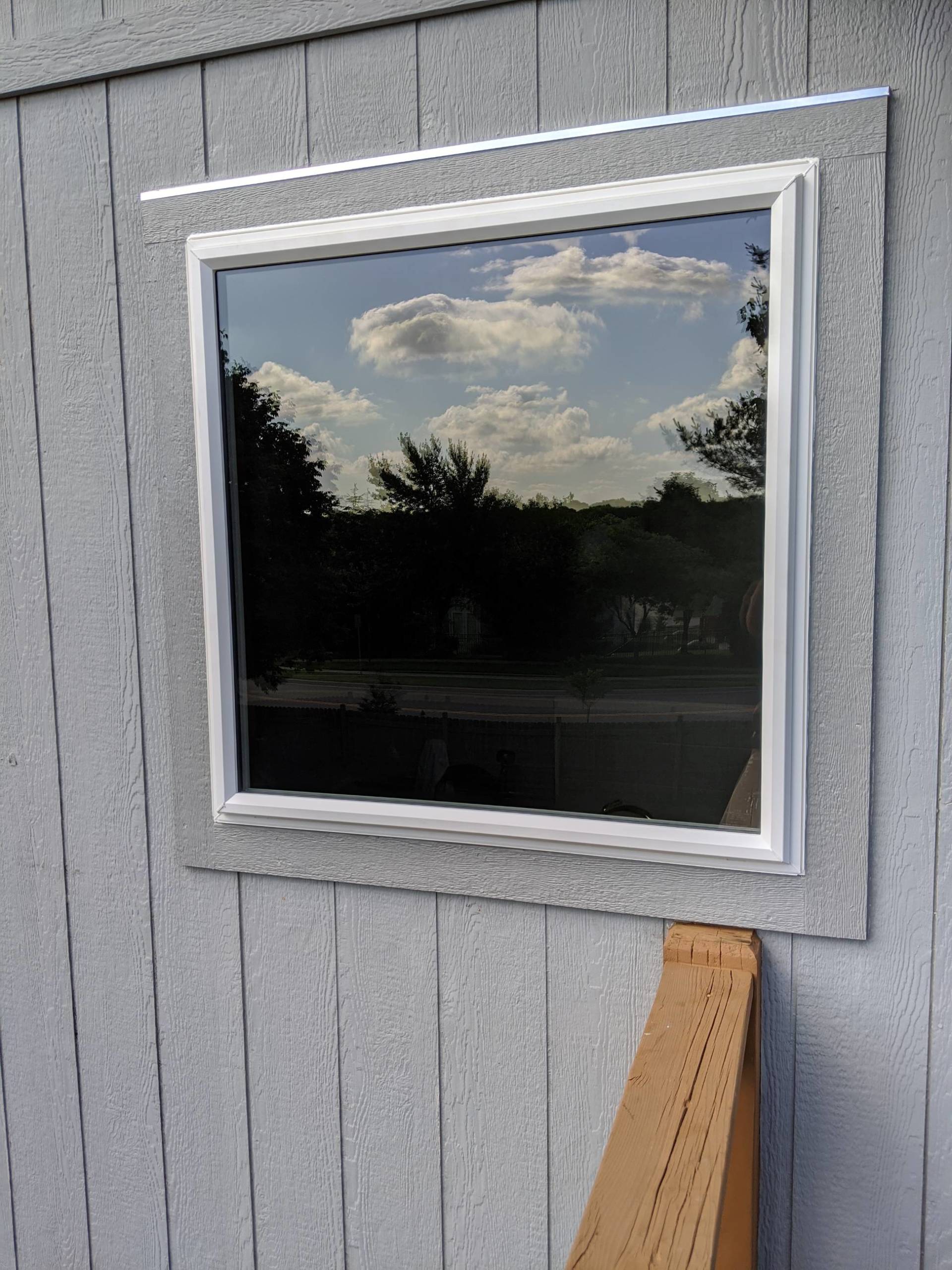 before and after picture of single hung window installation