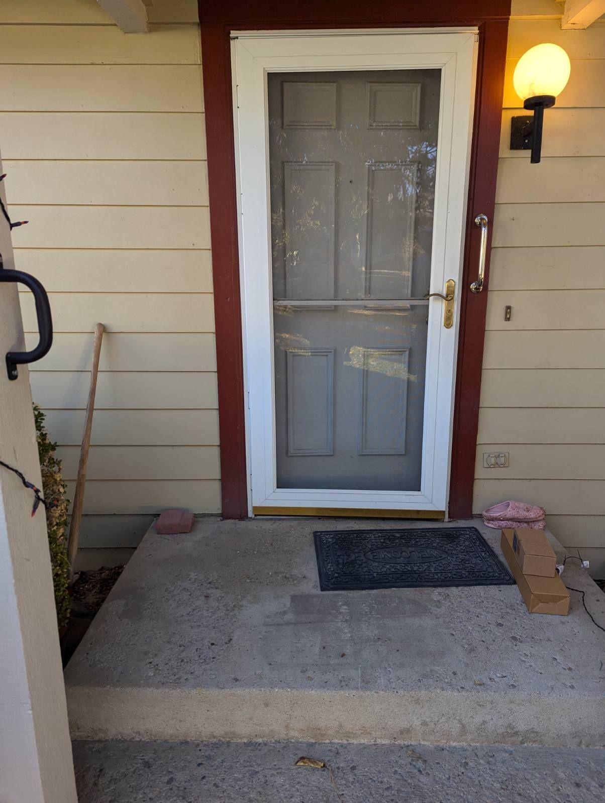 white entry door with 2 glass panels on both sides