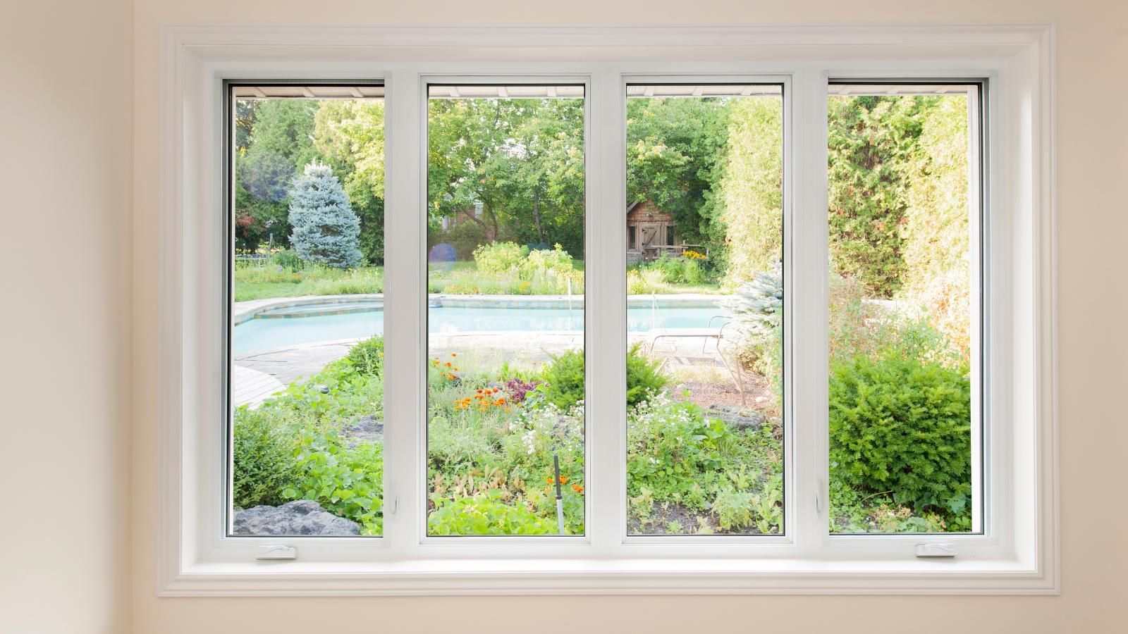 Recently replaced casement windows with flowers.