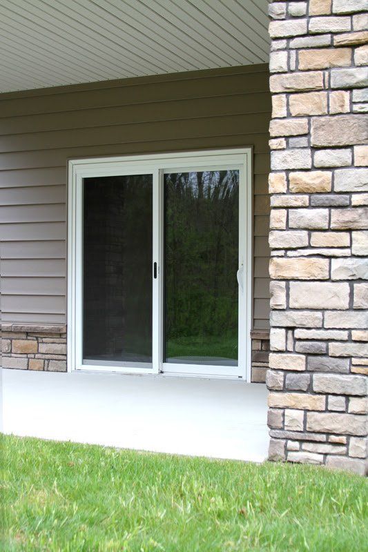 outside view of patio door on stone house