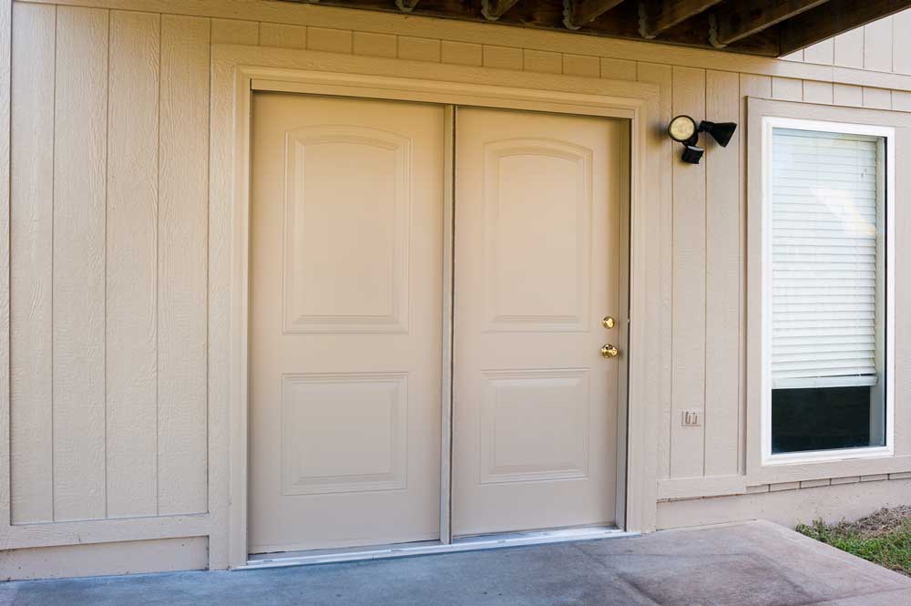 recessed panel double doors in home entryway