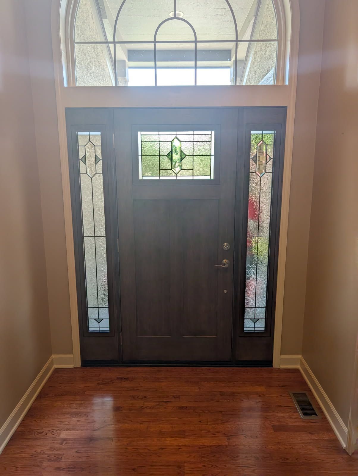 home archway with decorative front entry door