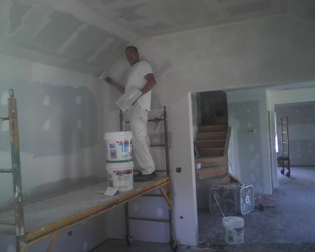 Man Painting the Wall — Hammond, IN — Bob's Plastering & Painting
