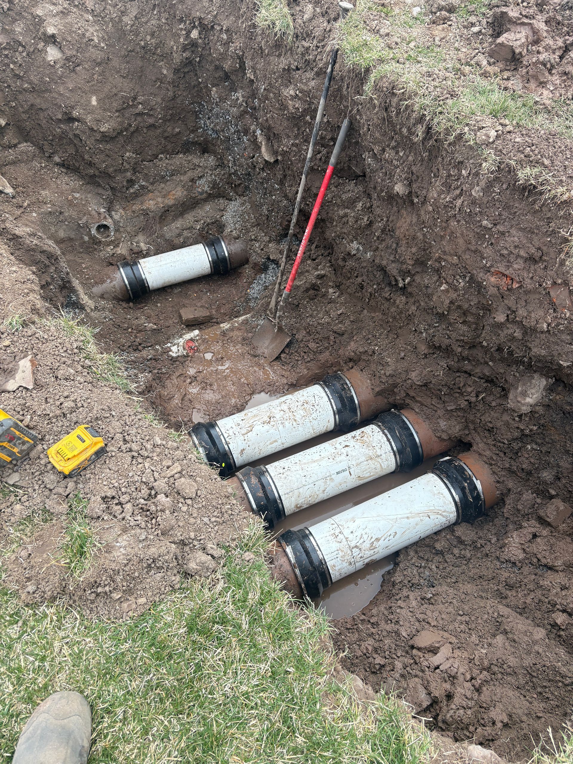 Technician Checking Air Conditioner — Biglerville, PA — Frantz Plumbing