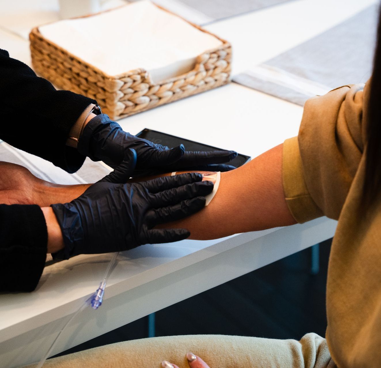 Revive employee preparing the patient for injecting the  medicine