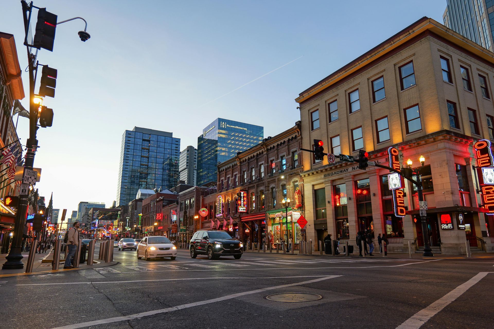 A city skyline with a yellow bridge in the foreground.