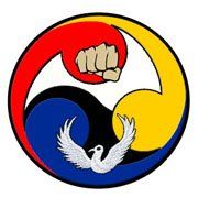 A fist is in the middle of a circle with a bird in the middle.