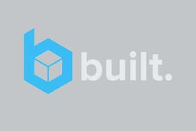 The logo for built is blue and white on a gray background.