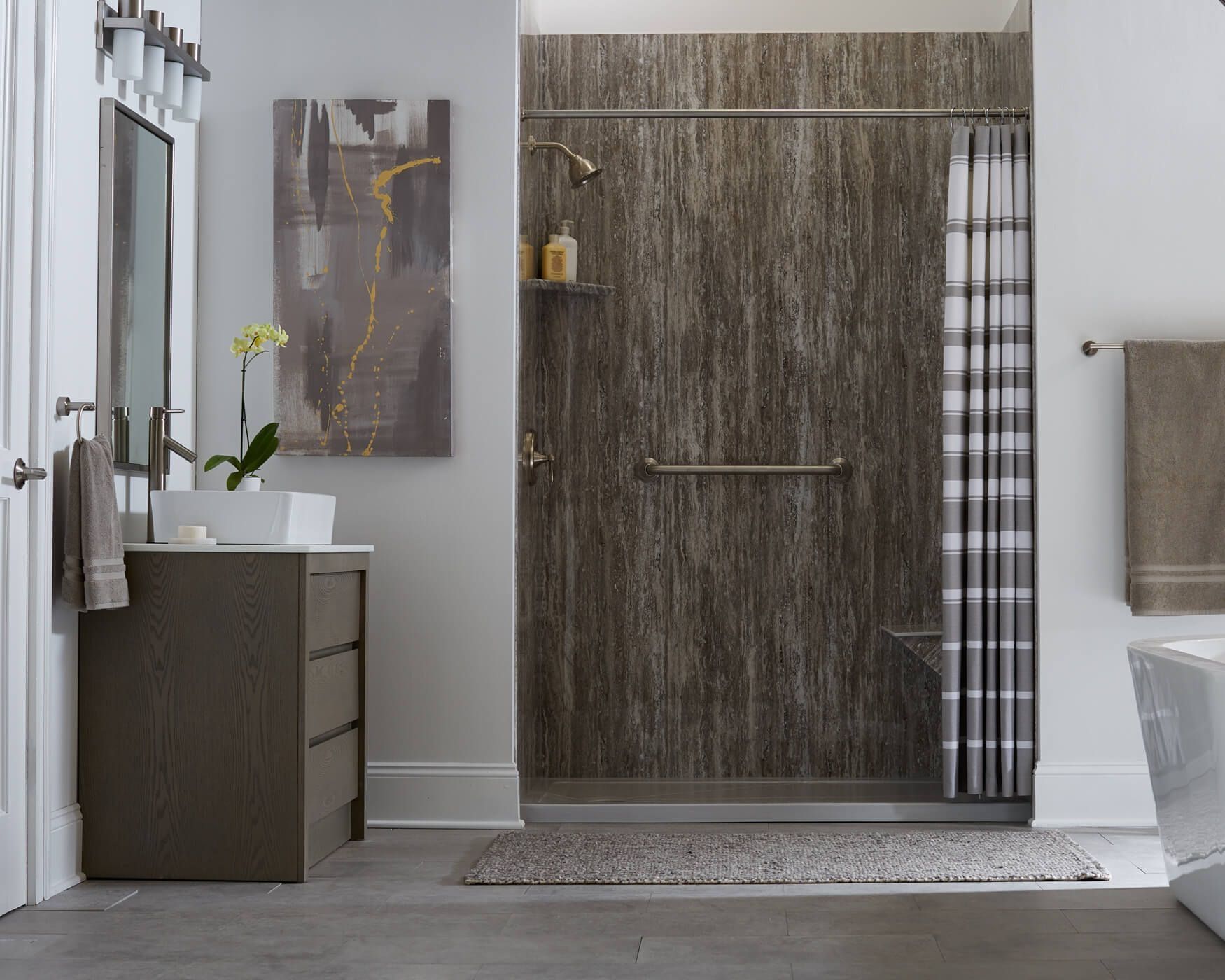A bathroom with a walk in shower , sink , and bathtub. A bathroom with a walk in shower , sink , and bathtub.