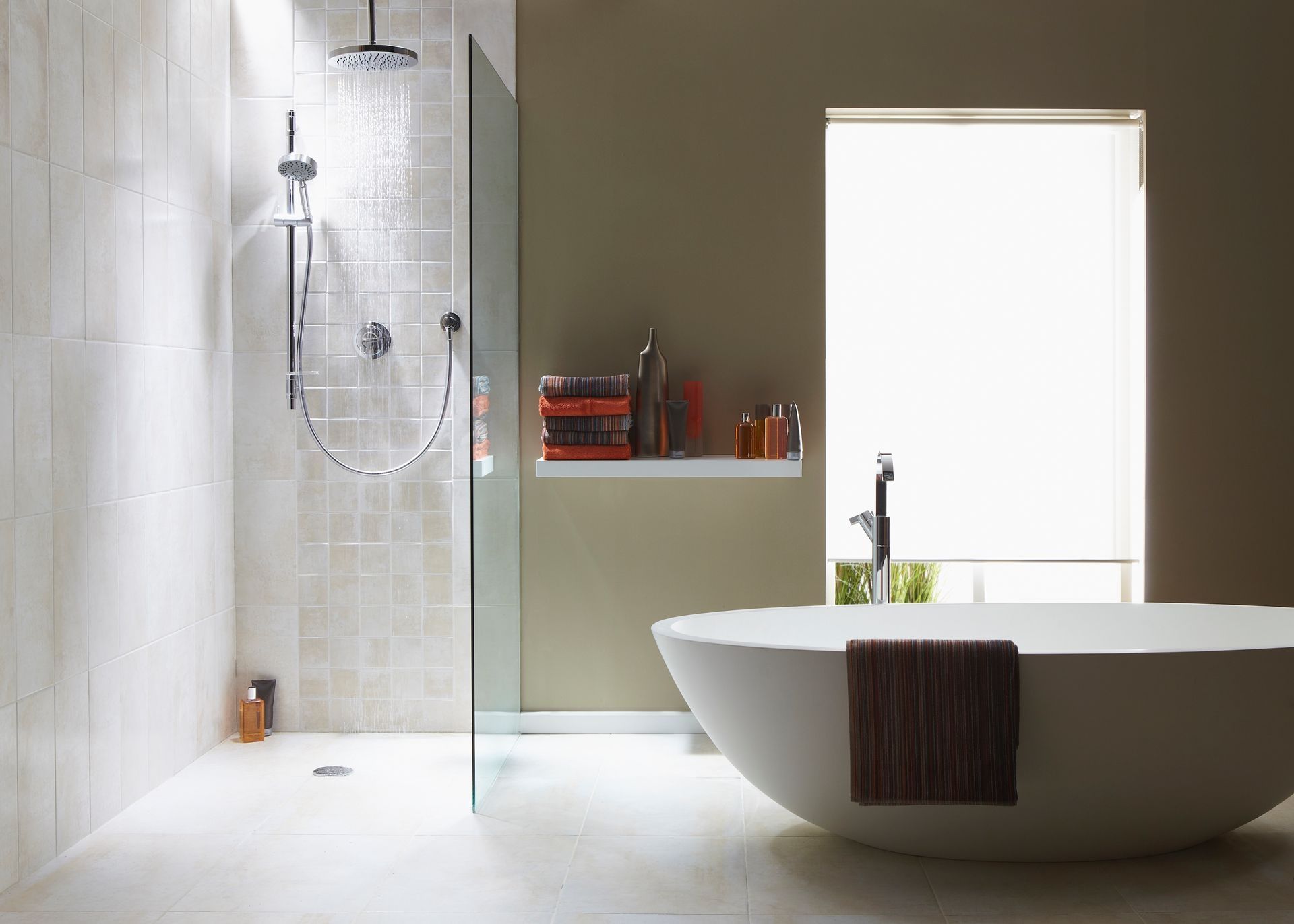 A bathroom with a bathtub and a walk in shower A bathroom with a bathtub and a walk in shower