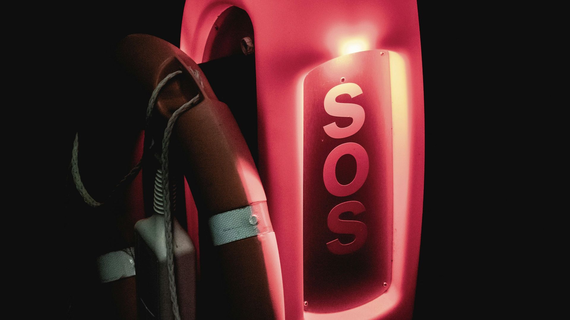 Red life preserver and container with illuminated