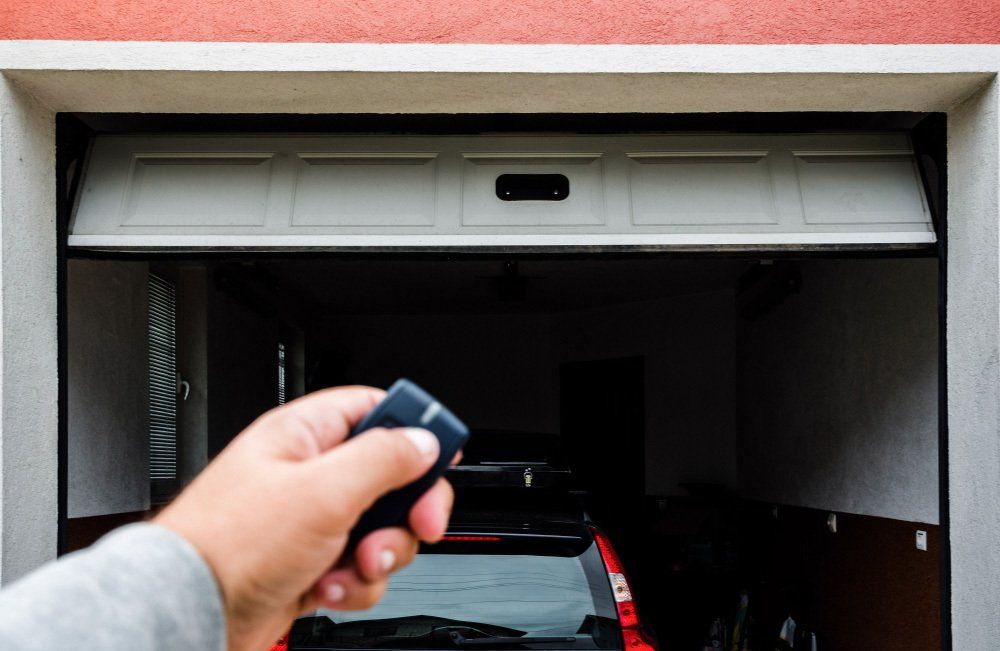 Closing the Garage Door Using Remote — Local Electrician in Port Stephens, NSW