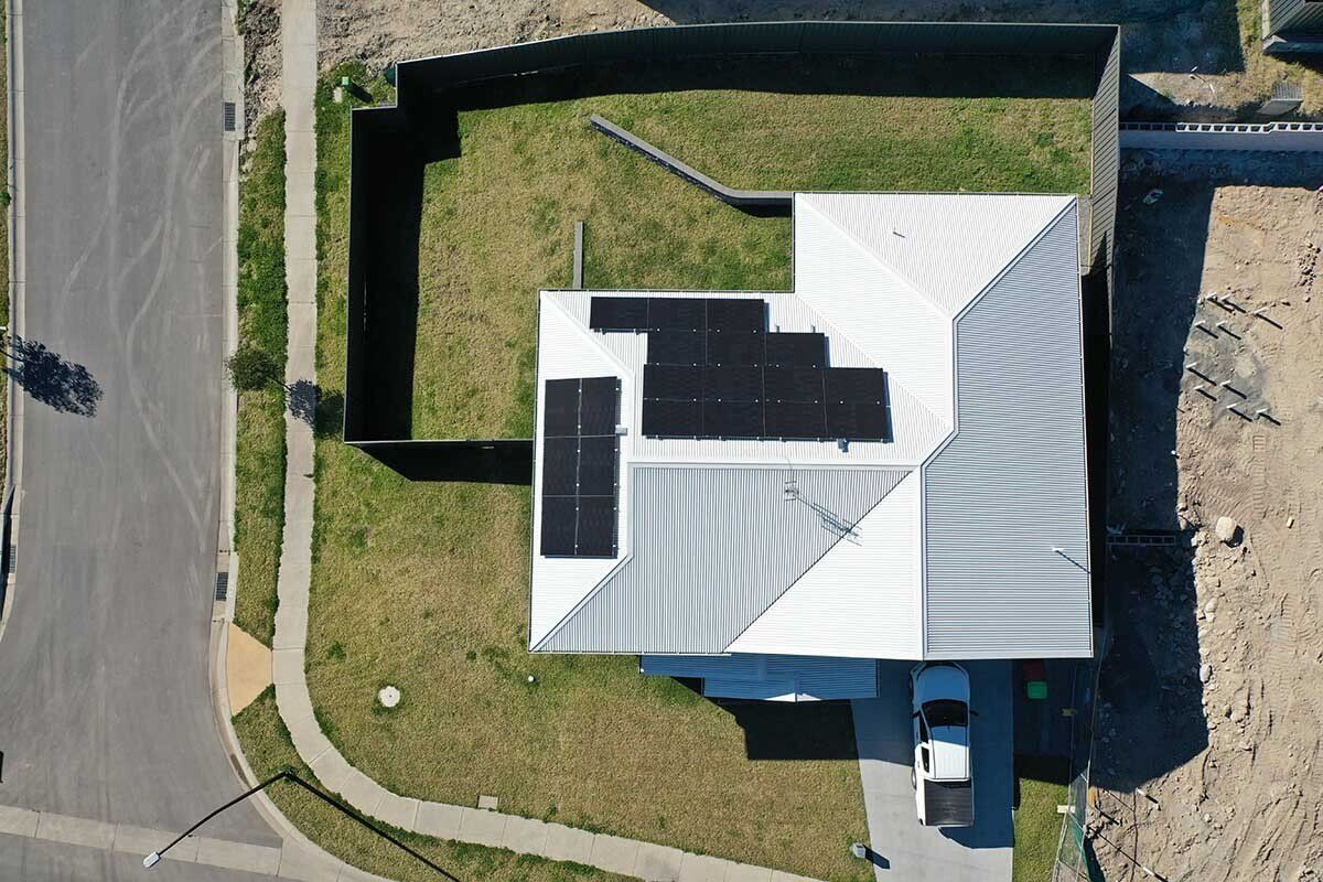 White Roof with Solar Panels — Local Electrician in Port Stephens, NSW