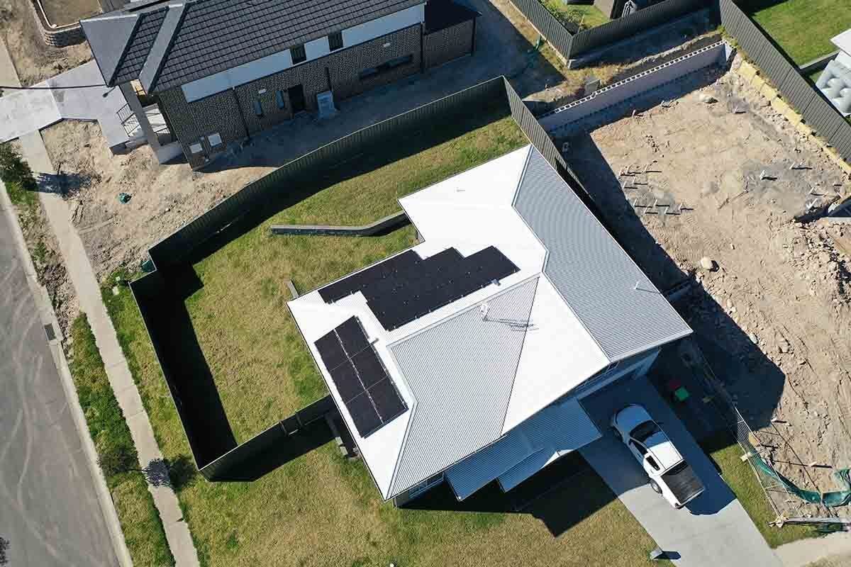 Aerial View of Residential House with Solar Panels — Local Electrician in Port Stephens, NSW
