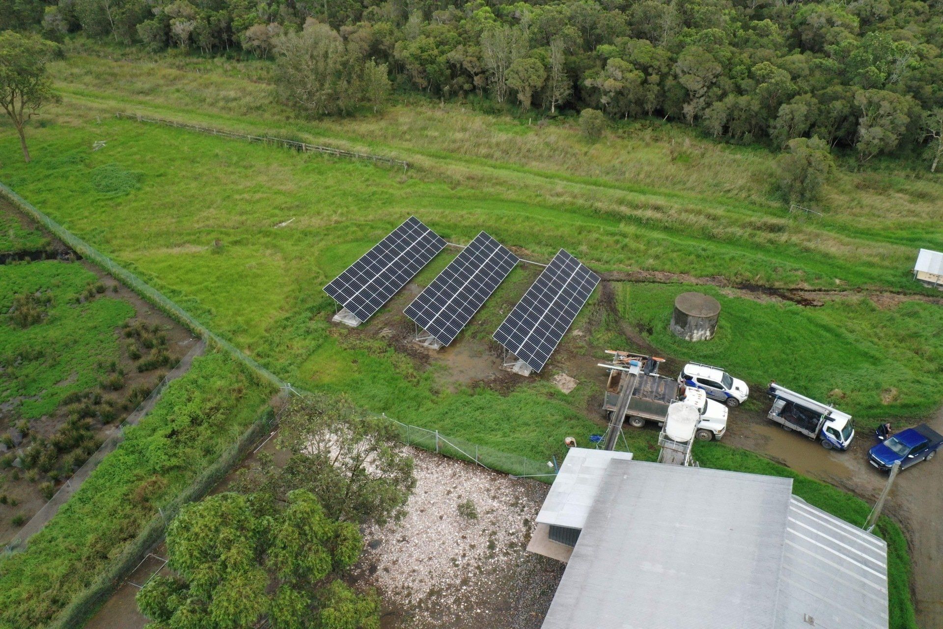 Aerial View of Residential House with Solar Panels  — Local Electrician in Port Stephens, NSW