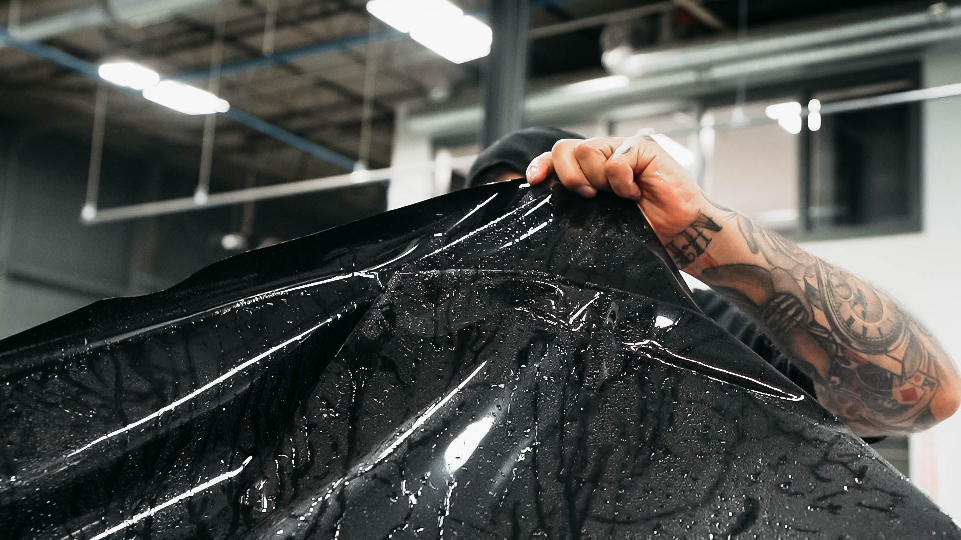 The interior of a tesla model 3 with white seats