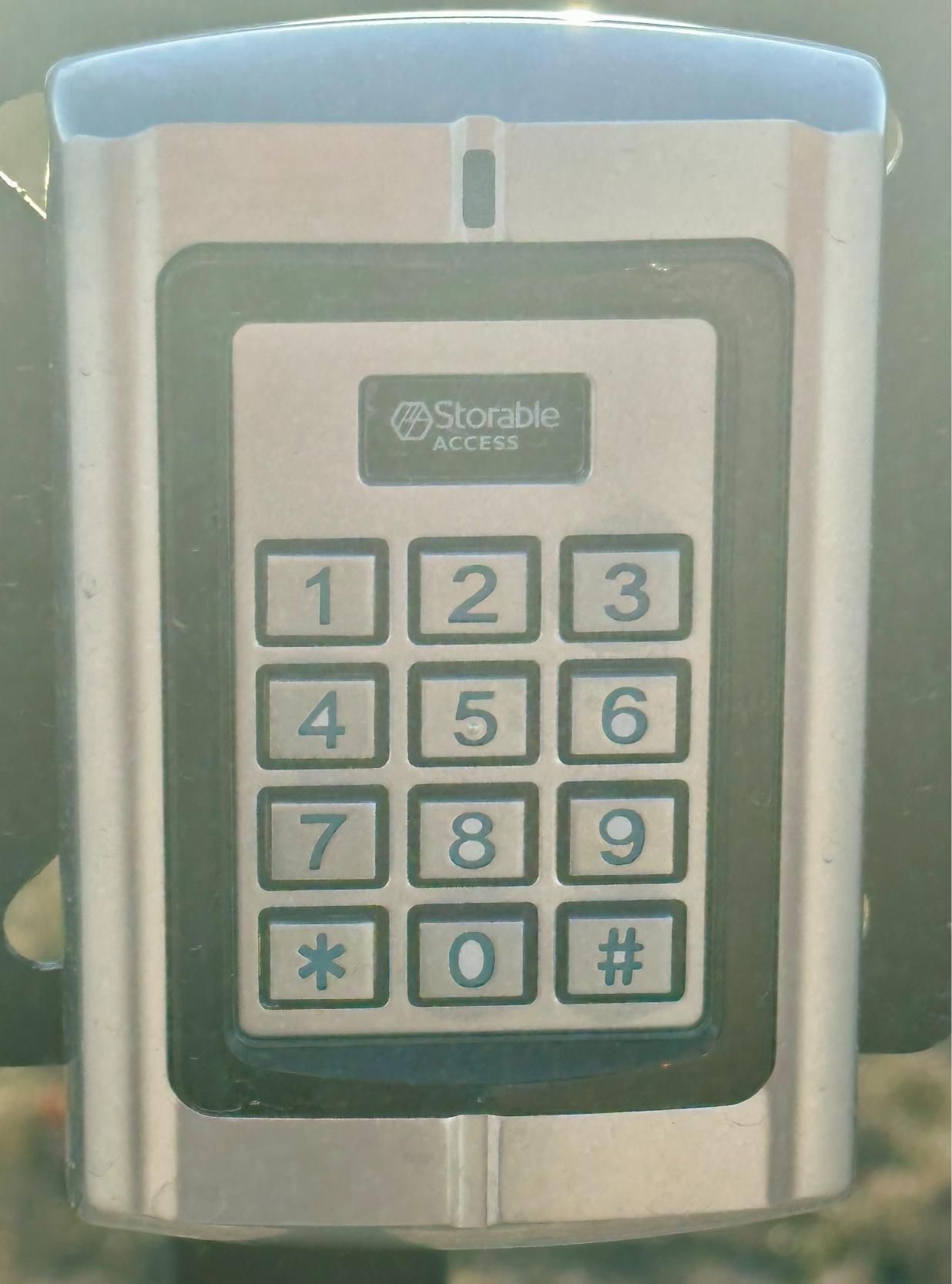 Silver keypad with number buttons and 